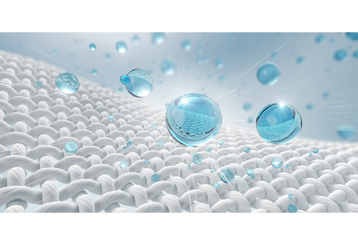 Απεικονίζονται σταγονίδια νερού πάνω σε ύφασμα.